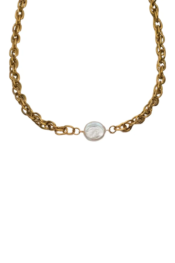 Collar Solenne Perla Barroca Collar de cadena gruesa dorada modelo Solenne con dije de perla barroca blanca en el centro.
